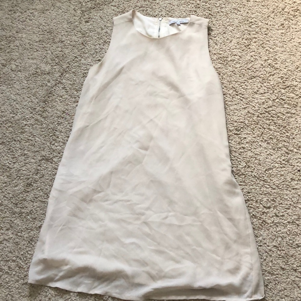 Nude sleeveless mini dress